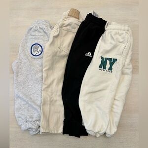 Lot of 4 Boys pants sz 3-4 small stain as pictured on khaki pants.